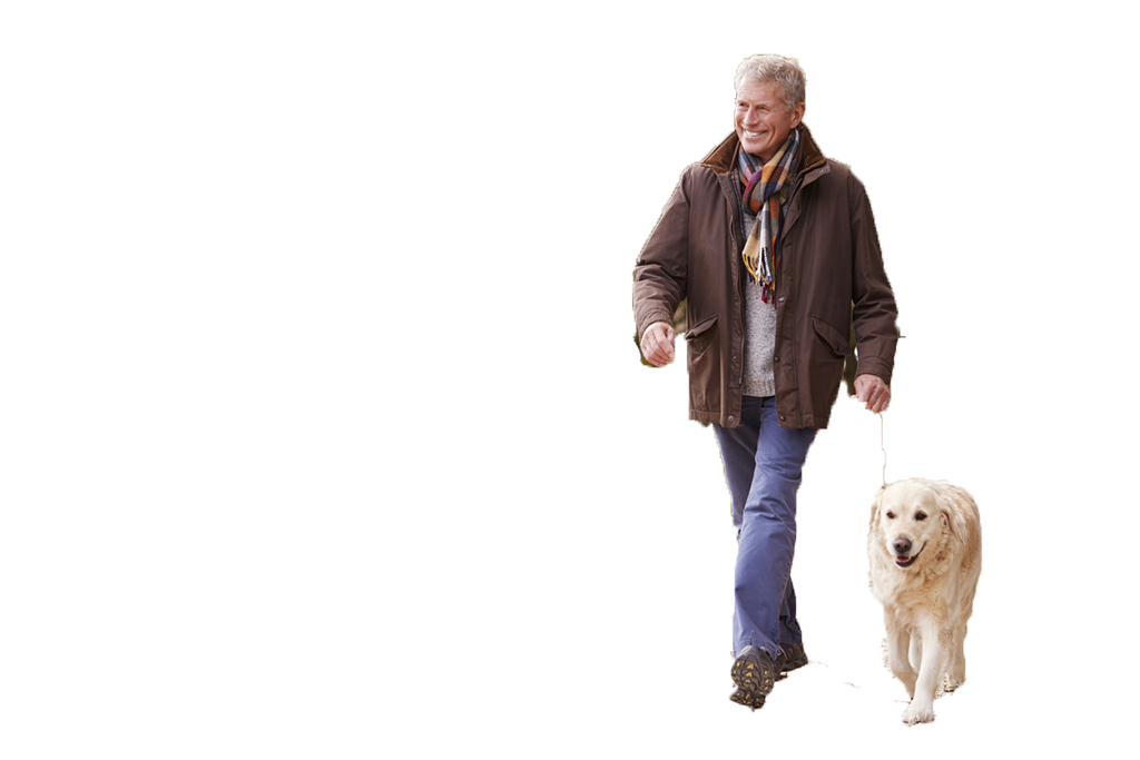 Mature man walking with dog